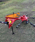 All In One Hay Baler Wrapper And Rake Tedder Combo HB3120 HW20 HT100 for Farm Use with red rake tines on grass