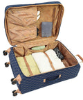 Open suitcase from Queensbury 4 Piece Luggage Set Navy showing interior with items and quilted polyester material.