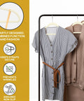 50 Pack Ultra Slim Velvet Closet Hangers Top Shelf Non Slip Felt Coat Jacket Dress Organizers Space Saving Closet Game Heavy Duty Swivel Hook Smooth Glide Ivory holding a striped dress and sweater.