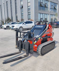 Mini Skid Steer Loader With 1800Lbs Capacity And Pallet Fork Attachment For Small Projects parked on concrete surface