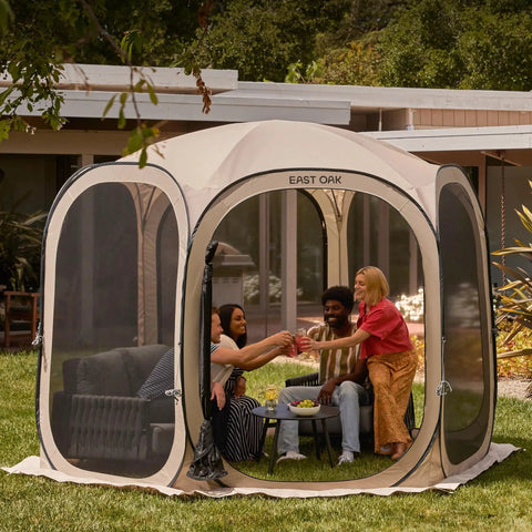 Pop Up Screen Tent Oasis 10 By 10 Ft Portable Screen Room Canopy with people inside enjoying bug-free outdoor fun, beige