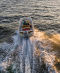 Boat on water using Universal Outboard Fuel Line Kit With 7 Foot 3 Eighth Inch Hose UV Resistant EPA CARB Compliant Primer Bulb Connectors