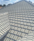 Heavy Duty Tile Roof Glaze And Clear Shielding Sealant With Urethane Reinforced Strength For Tough As Nails Weather Barrier And A Sleek Satin Finish That Gonna Save Your Tiles From Failing In A Practical Five Gallon Size on a tiled roof.