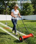 14 Inch Hand Push Reel Lawn Mower For Small To Medium Yards No Fuss Manual Cut With Precise Scissor Like Blades And Adjustable Height Settings For A Clean Healthy Lawn, woman mowing grass