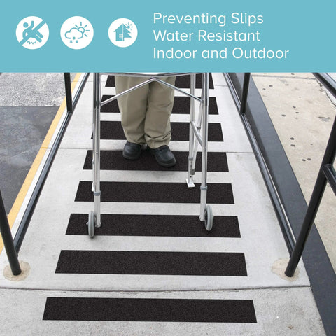 Lifegrip anti-slip traction tape on stair treads; black 4-inch-wide strips for indoor/outdoor use.