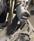 Person using Air Straight Die Grinder 0.33 HP 25,000 RPM With Vane Motor on metal piece for precision work in a workshop setting.