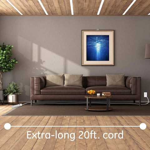Living room with Must-Have Six-Outlet Surge Protector Power Strip 2 Pack With 20 Ft Extension Cord on floor by sofa.