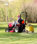 Person using 25 Gallon Trailer Sprayer For Lawn Care With 10 Inch Roll On Tires No Nonsense Tow Behind Your Riding Mower Or ATV
