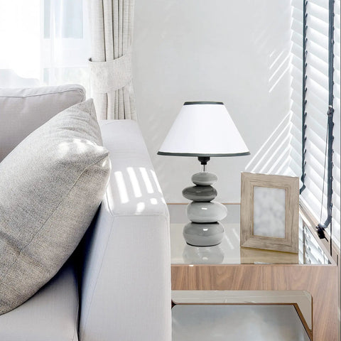 Shades Of Gray Ceramic Stacked Stone Table Lamp With Fabric Shade, 14.7 Inch Modern Bedside Light on glass end table next to sofa