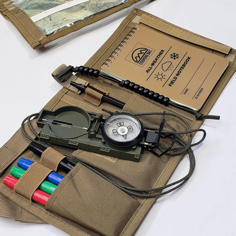 Advanced Compass Navigation Kit With Multifunction Case And Protective Map Pouch In Tan, showing open case with compass, notebook, and pens