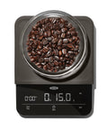 Precision Coffee Scale With Built In Timer For Pour Over, 6 Pound Capacity, coffee beans displayed on digital screen