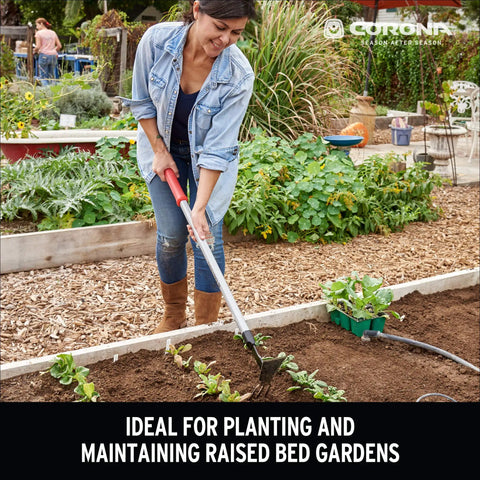 Person using Extended Reach Hoe And Cultivator All In One Garden Tool For Weed Busting And Soil Loosening with long handle
