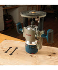 Rock Solid Dual Stitch Router Inlay Clear Block Thick Acrylic Jig Made For Plunge Routers Using 1/8 Bit Sizes To Nail Precision Woodworking Layouts And Fit Tight on a wooden table with a Bosch router.