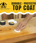 Hand applying All Purpose Shop Wax Finish Paste With Carnauba Beeswax For Metal Wood Epoxy Plastic Leather And More on a wood surface