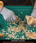High Carbon Steel Right Handed Hook Knife For Wood Carving Spoon Gouging With Killer Sharp Edge Rugged Oak Handle Pro Whittling Tool For Bowls And Weekend Projects in use, crafting a wooden cup.