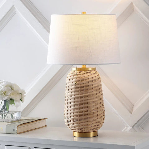 Brass Gold And Light Brown Rattan LED Table Lamp With White Linen Shade, 25 Inches Tall, on a white wooden console.