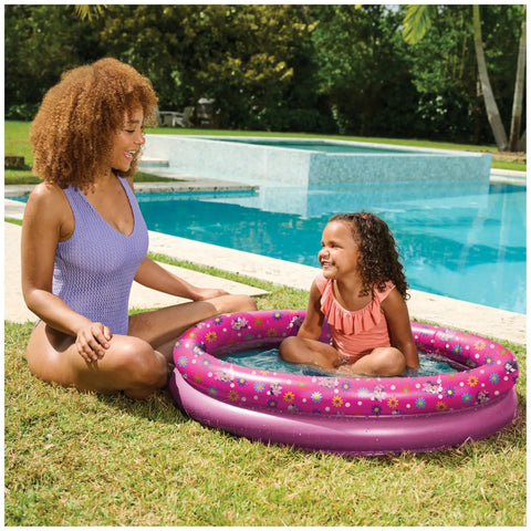 Child playing in a Minnie Mouse Kiddie Pool For Backyard Fun Inflatable Above Ground Pool With Easy Setup Durable Kid Friendly Pool Toy