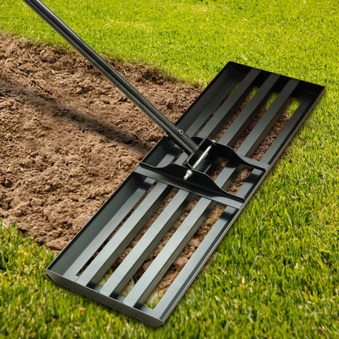 Heavy Duty Landscape Rake With 30 By 10 Inch Head And 78 Inch Detachable Stainless Steel Handle For Lawn Leveling And Yard Cleanup On Backyard Garden Golf Course Farm Pasture in use