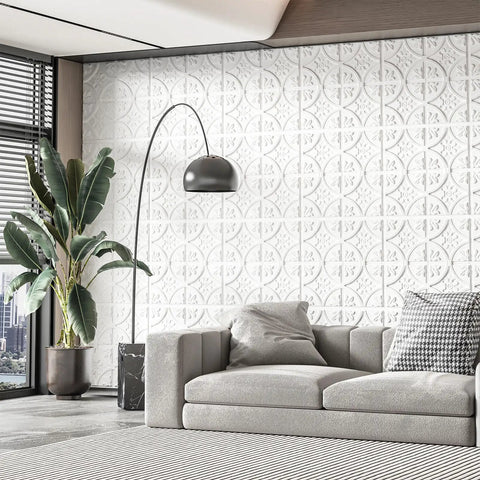 Living room with 2x2 drop ceiling tiles 12 pack PVC glue up panels white traditional style on wall behind gray sofa.