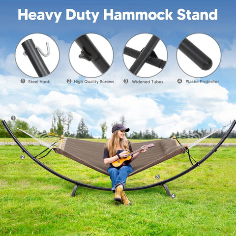 Woman sitting on Sturdy Standing Hammock With Foldable Steel Stand For Patio Or Deck, Portable 2-3 Person Hammock, easy assembly shown.