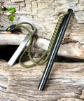 6 Inch Survival Fire Starter Ferro Rod With 3/8 Inch By 6 Inch Size on wooden surface, green paracord attached.