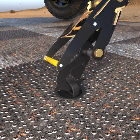Close-up of Beefy Rugged Car Tie Down Straps For Trailers 2 Inch Wide By 10 Foot Long With 10000 Pound Break Strength securing a trailer.