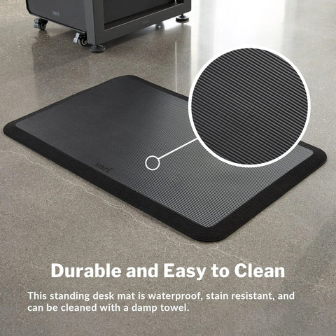 Standing Desk Anti Fatigue Mat 34X22 Inches Cushioned Non Slip Floor Pad for Home Office Kitchen, Black, on a polished floor