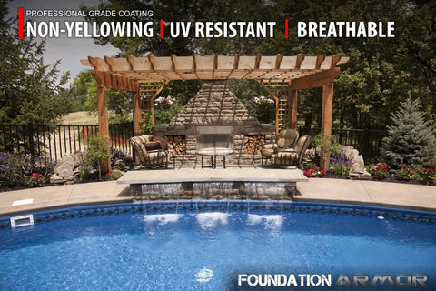 Heavy Duty Concrete And Paver Sealer Packing A Killer Low Gloss Wet Look Finish Top Shelf Color Boosting Solvent Based Acrylic Formula For Exterior Slabs And Patios 5 Gallon Size applied around a pool area with a stone fireplace.