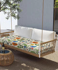 Outdoor Bench Cushion With Ties 42 Inch By 18 Inch Waterproof Polyester Cover on a porch swing with floral pattern under a tree.