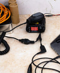 UV-25X2 Second Gen Mini 25 Watt Dual Band Base Station Radio with RJ45 microphone on desk, ideal for home use.
