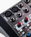 Close-up of ZEDi-8 Compact Hybrid Audio Mixer and USB Interface GS Pre preamps and input knobs for home studio and live gigs.