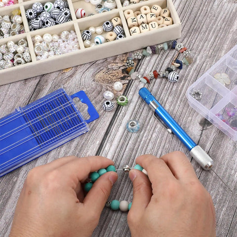 Hands using 21 Piece Metric Mini Drill Bit Set With Pin Vise For Ultra Fine Wood And Jewelry DIY HSS Twist Drills on a bead project.