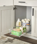 Top Shelf Pull Out Cabinet Organizer, Heavy Duty Pantry Drawer Rack For Kitchen Laundry Room, Rock Solid Slide Out Storage Rack For Pots Towels And Cleaning Supplies, Clean White, with cleaning supplies visible inside cabinet.