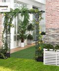 82 Inch Metal Garden Trellis Arch With Durable Steel Tubing And Elegant Scrollwork, Weather Resistant Gray Finish in garden setting