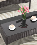 Glass coffee table from 4 Piece Wicker Patio Furniture Set with pink tulips and coffee cups, khaki finish, weather resistant