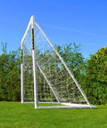 Side view of 8ft by 6ft All Weather Soccer Goal With Durable uPVC Frame, Easy Setup For Quick Play, in backyard setting.