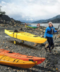 Person using Go-To Universal Kayak Carrier Trolley For Kayaks Canoes Paddleboards Float Mats And Jon Boats With 200-Pound Capacity