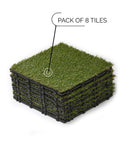 Stack of 8 interlocking artificial grass tiles for outdoor decking and indoor decor, 11.8 inches square, side view.