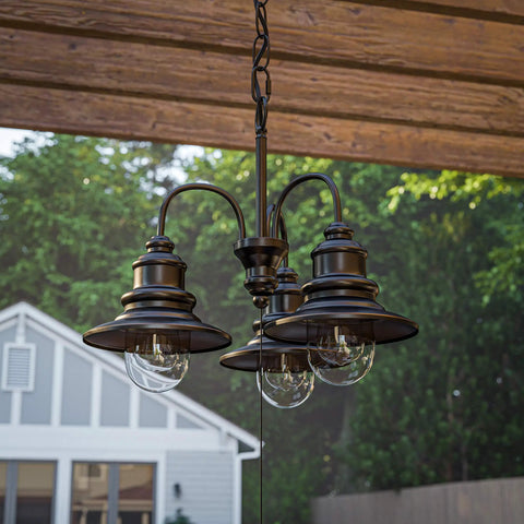 Broadcast 3 Light Outdoor Chandelier In Oil Rubbed Bronze With Copper Highlight Finish For Rustic Coastal Industrial Vibe On Patios And Decks, 18 Inch Tall By 21 Inch Wide By 21 Inch Deep hanging from wooden pergola