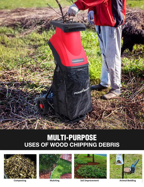 Person using red Electric Wood Chipper Shredder for Yard Cleanup That Really Chews Through Branches 21 To 1 Reduction 1.77 inch