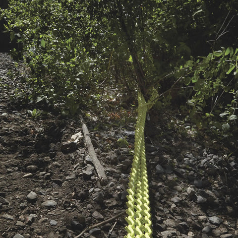 Heavy Duty Triple Chain Shrub And Clump Remover Tool With Four Foot Pulling System attached to bush for root extraction