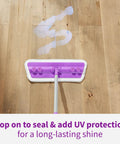 Mop applying All Floors Restorer That Fills Scratches Brings Back Deep Shine And Locks In Protection For Hardwood Laminate Vinyl And Tile With One Slick Coat 1 Gallon on hardwood floor