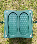 Stand Up Swing For Backyard Playsets With 14x14 Inch Base Coated Chains Pinch Free Design on grass lawn