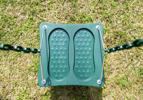 Stand Up Swing For Backyard Playsets With 14x14 Inch Base Coated Chains Pinch Free Design on grass lawn