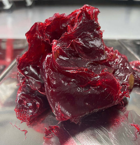 Close-up of red lithium grease from Go To Lithium Grease Superkote 2000 NLGI 2 EP Grease For High Temperature Heavy Duty Use.