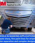 Person applying Indigo Fine Line Paint Masking Tape One Eighth Inch By Thirty Six Yard for precise striping on vehicle.