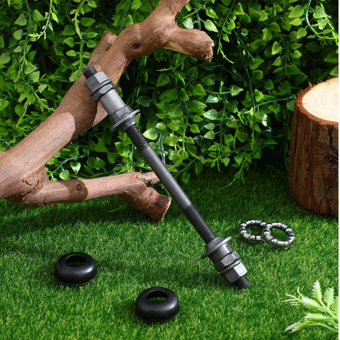 No Sweat Rear Axle Replacement For Mountain Bike 180mm Steel Shaft With 25mm Bearing And Washers Corrosion Resistant shown on green grass.
