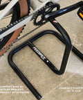 Scorpion Moto Style Portable Bike Stand With Bottom Bracket Crankarm Support For Road MTB Cyclocross And Ebike Two Piece Black Grab And Go Stable Space Saving Storage For Garage Or Home supporting bike bottom bracket with dimensions labeled.