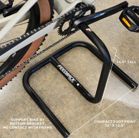 Scorpion Moto Style Portable Bike Stand With Bottom Bracket Crankarm Support For Road MTB Cyclocross And Ebike Two Piece Black Grab And Go Stable Space Saving Storage For Garage Or Home supporting bike bottom bracket with dimensions labeled.
