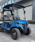 Kick Back In Style On This 2 Seat Electric Golf Cart Designed For Sightseeing And Leisure With Smooth MacPherson Strut Suspension 4KW Motor Advanced Disc Brakes And Huge Touchscreen Entertainment Setup. Blue two-seater electric golf cart in an outdoor setting.